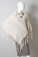 Ivory Turtleneck Knit Poncho With Tassels